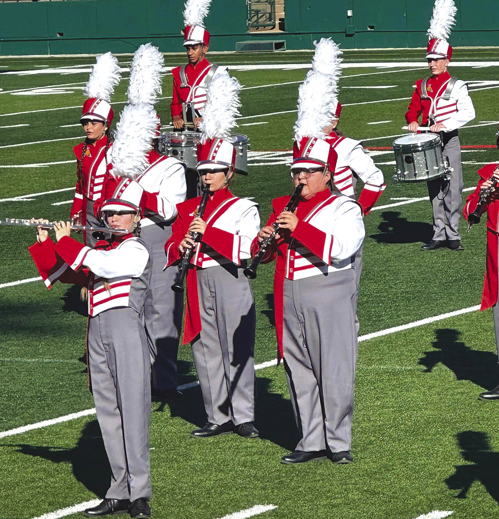 Members of the Ragin’ Red Band concentrate on their music during the Region 6 UIL marching competition held Monday. Their performance earned them a trip to the area contest this weekend in Amarillo. Courtesy Photo By Cricket Thompson