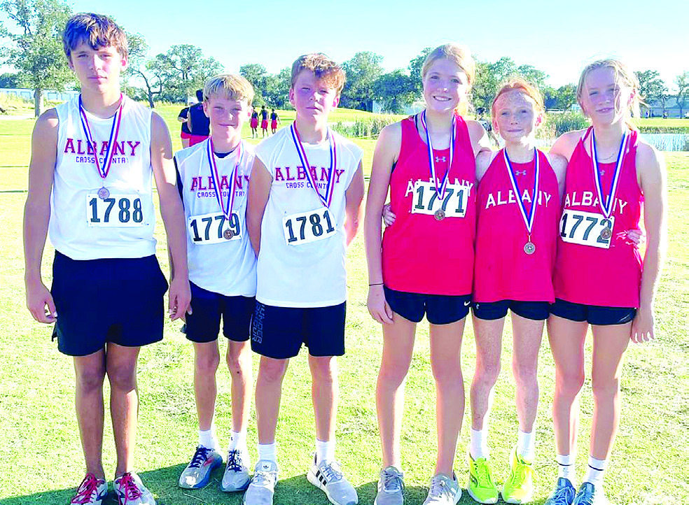 Junior high medalists at last week’s district cross country meet include (l-r) Lyle Wheeler, Trevor Bellah, Blake Britting, Keeley Britting, Tinley Hefner, and Hattie Fikes. Courtesy Photo