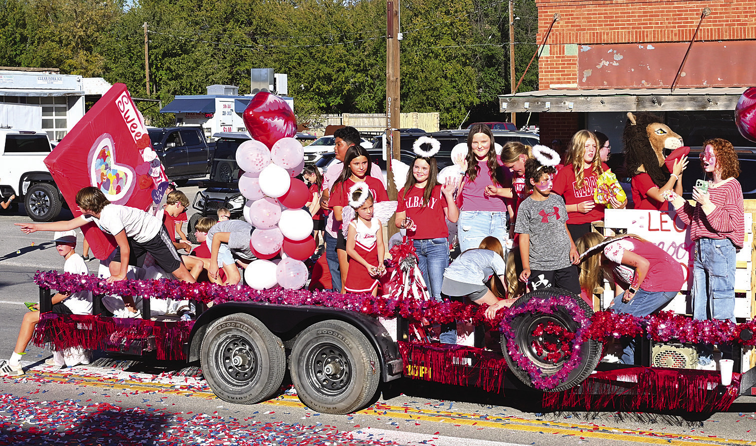 Class-y entries. High school classes with “holiday” floats in the 2023 parade included (clockwise from top right) the freshmen with Christmas in third place, junior high with their unjudged float for Valentine’s Day, and juniors with Halloween in fourth place. Honorees riding in cars were also part of the parade. Donnie Lucas /AlbanyNews