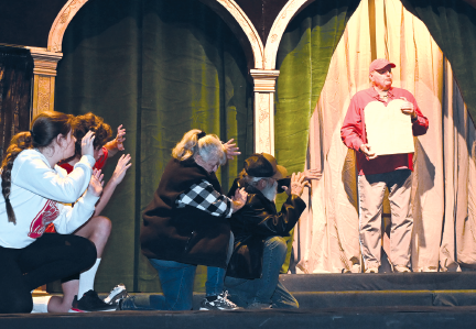 John Tate, portraying Moses in the Albany Nativity, rehearses with members of the Patriarchal Family for this weekend’s performances. Tickets for the biennial production are provided free of charge as a gift to the community, with the Nativity beginning at 7:30 p.m. on both Friday and Saturday nights.