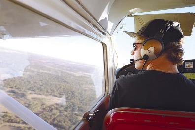 Cache Clark, an Albany High School junior, pilots a plane after earning his pilot’s license at just 17 years old, following over a year of training and over 75 hours of logged flight time. PHOTO BY LONDON GROVES