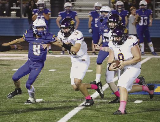 Zaykk Sandefer (r) gets good yardage with Ellis Hise providing some help during the Bulldogs’ loss to Trent last week. Moran scored 72 points, but still came up short. Photo Provided By Moran School