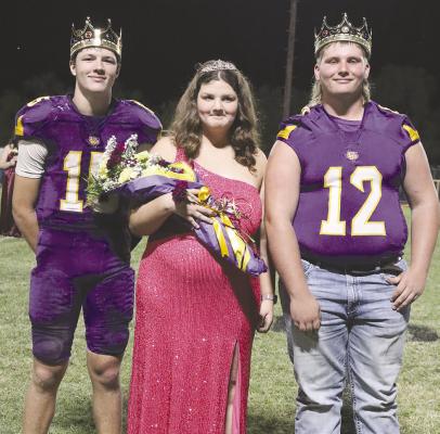 Braylee Stautzenberger (c) was crowned last week as Moran’s homecoming queen. Fellow seniors Ellis Hise (l) and Cotten Campbell (r) shared the honor of homecoming king. Photo Provided By Moran School
