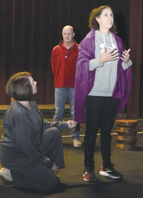 Cali Rose (r) rehearses a scene from “The Nativity” with Gaye Davis (l) and Jeff Davis (back) ahead of the Dec. 13-14 performances. The Christmas story is a biennial tradition, with the script written by Robert Nail more than 80 years ago. Donn ie Lucas / Albany News