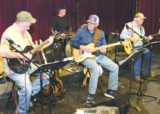 Band members (l-r) John Caldwell, Keith Kniffen, Randall Palmore, and George Harvick, rehearse one of the numbers to be performed at Saturday night’s Aztec musical. Along with accompanying the rest of the vocalists, each of the band members will sing their own favorites among “Our Songs.” Donnie Lucas / Albany News