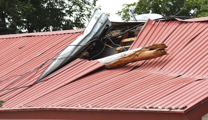 Power pole impales local business