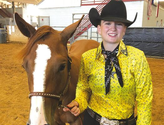 Recent graduate Faith Fry is the recipient of a scholarship from the Arabian Horse Foundation. She competed in the Arabian world horse judging contest last fall. Courtesy Photo