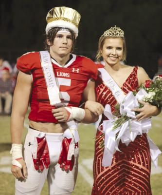 Seniors (l-r) Adam Hill and Robyn Trail were crowned as Albany’s Homecoming King and Queen last Friday night. A number of other honorees were also presented during the halftime ceremony. Photo By Amanda Tab or