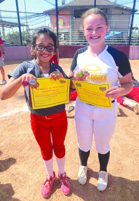 Albany softball player Mia Smith (l) was named as a tournament MVP, along with a Cisco athlete, at the end of the District 11 tourney last weekend. The 12U Lady Lions finished second. Courtesy Photo