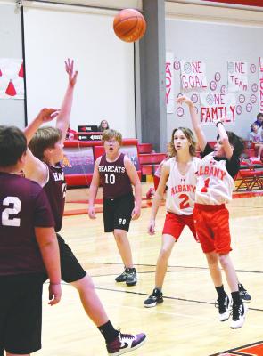 Jordan Knight puts up a two-point jump shot during junior high games against Hawley on Monday night. The Albany boys will host Hamlin on Dec. 4, while the girls are away. Donn ie Lucas / Albany News