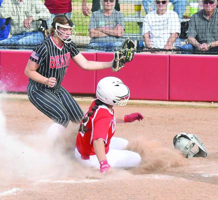 Carisa Barrera slides in safe at home for a score during the Lady Lions’ 9-3 win over Baird last Friday. Tuesday’s game with Abilene TCLA was rained out, but has been rescheduled for Thursday (today) at 5:00 p.m. Donnie Lucas / Albany News
