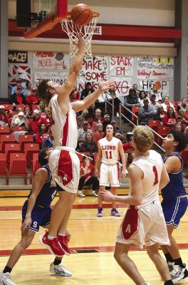Lions keep pace in district, look to move up