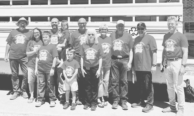 Members of a mission trip to Del Rio gather for a group photo on Sunday afternoon before pulling out for the 4-1/2 hour journey. Constructing a bunkhouse in a garage and installing drywall on a bedroom wall inside the mission house are part of this year’s projects. Courtesy Photo