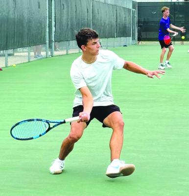Albany senior Luke Marshall, who along with Sidney Russell, has qualified for the state tennis tournament three times, focuses on the ball during a match last week. Jaci Chapman and Robyn Trail also medaled. Courtesy Photo
