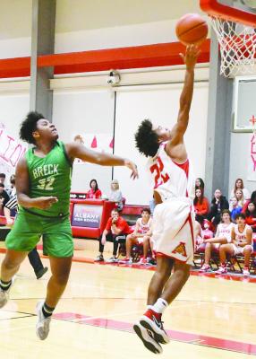 Sophomore Aaden Mendez (r) puts in a two-pointer during a game against Breckenridge in Albany’s JV tournament earlier this month. The boys have put a team on the court for several games, with the season to start in earnest Dec. 19. Donnie Lucas / Albany News