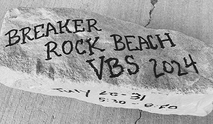 Finding this gold rock could mean a brand new bike for the child or student who brings it to the Community VBS set to start later this month. There are also 15 other “scripture rocks” hidden in the downtown and city park areas. Courtesy Photo