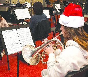 Albany senior French horn player Landon Kreitler practices for the upcoming band performance on Dec. 17. The 6th grade, 7th grade, and high school bands will perform starting at 6 p.m. at the high school auditorium. DONNIE LUCAS / ALBANY NEWS