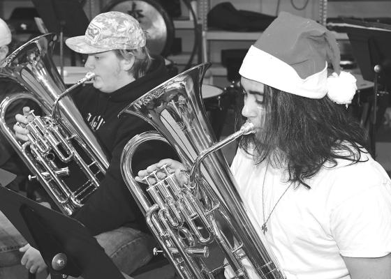Sterlin Hobbs and James Weaver (above l-r) rehearse for Sunday’s Christmas concert. Local eighth graders Karlyn Thompson and Charlee Patterson (at right, l-r) earned all-region honors last week. Donnie Lucas / Albany News