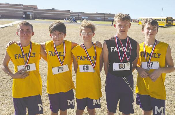 Moran junior high boys cross country team members, who won second at the district meet, include (l-r) Jason Burge, Christian Rodriguez, Dylan Herod, Andy Barron, and James Hise. Barron earned an individual medal with his ninth place finish. Photo Provided By Moran School