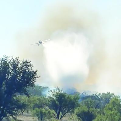 Volunteers fight county wildfires