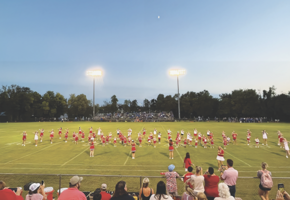 Albany cheer camp girls perform at season opener