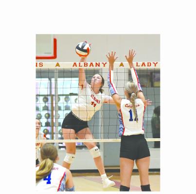 Ladies work to find footing before district